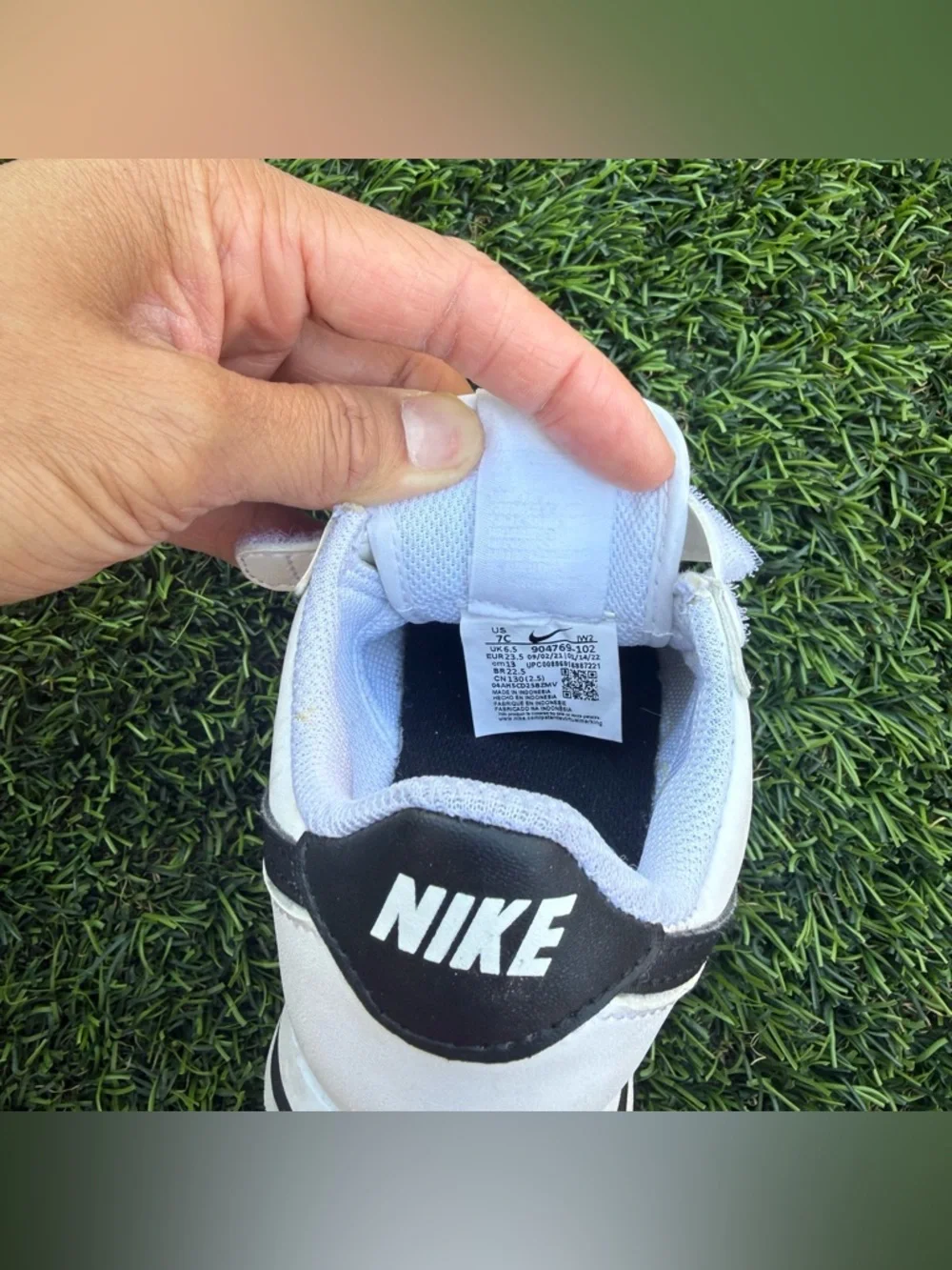 Nike Kids White Sneakers with Black Swoosh and Velcro